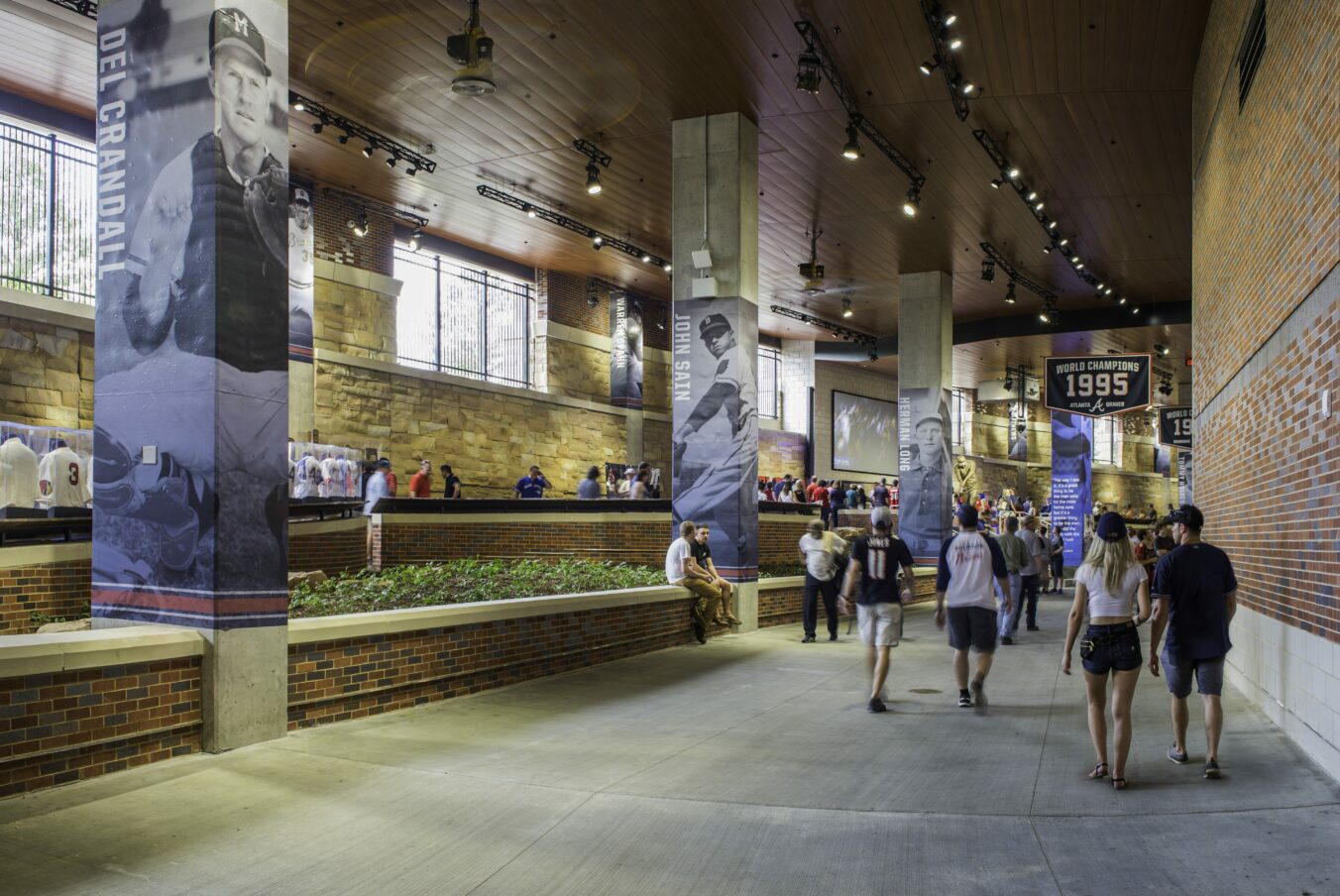 Braves fans walking through Truist Park concourse