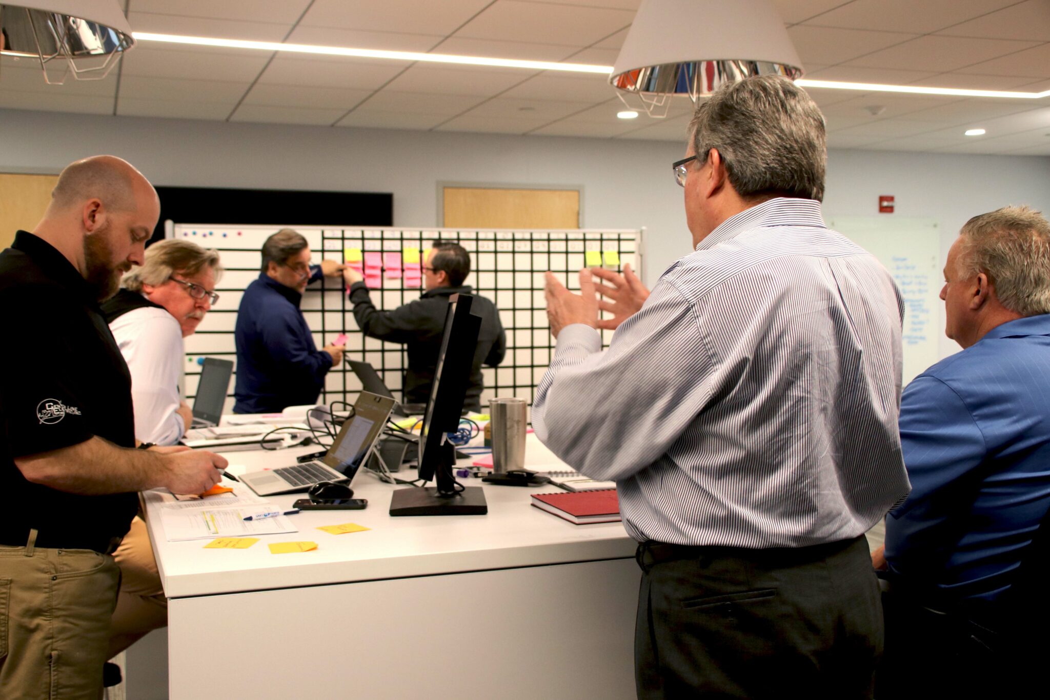 Employees discussing preconstruction and planning