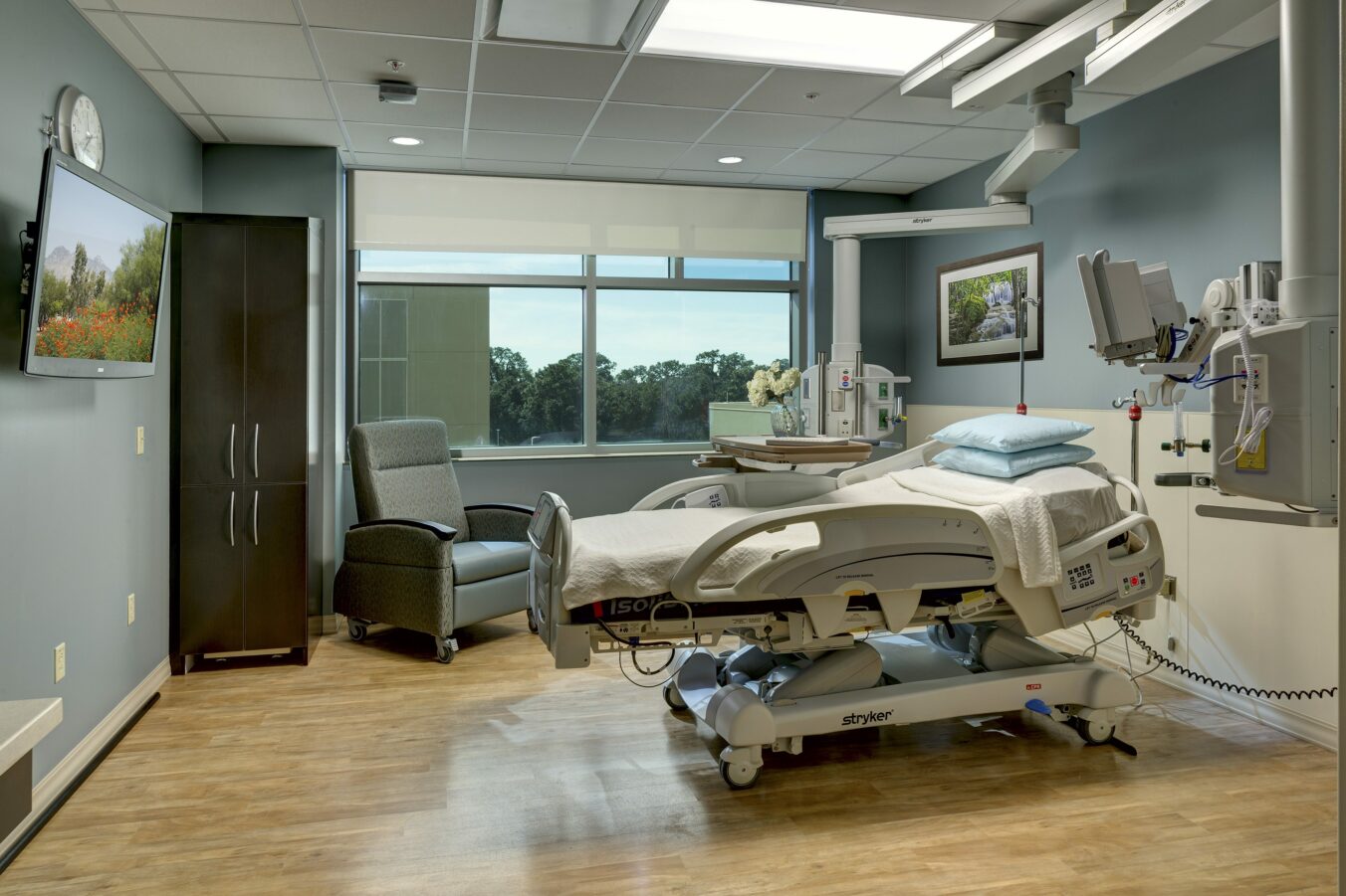 Patient room with hospital bed and medical equipment