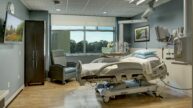 Patient room with hospital bed and medical equipment