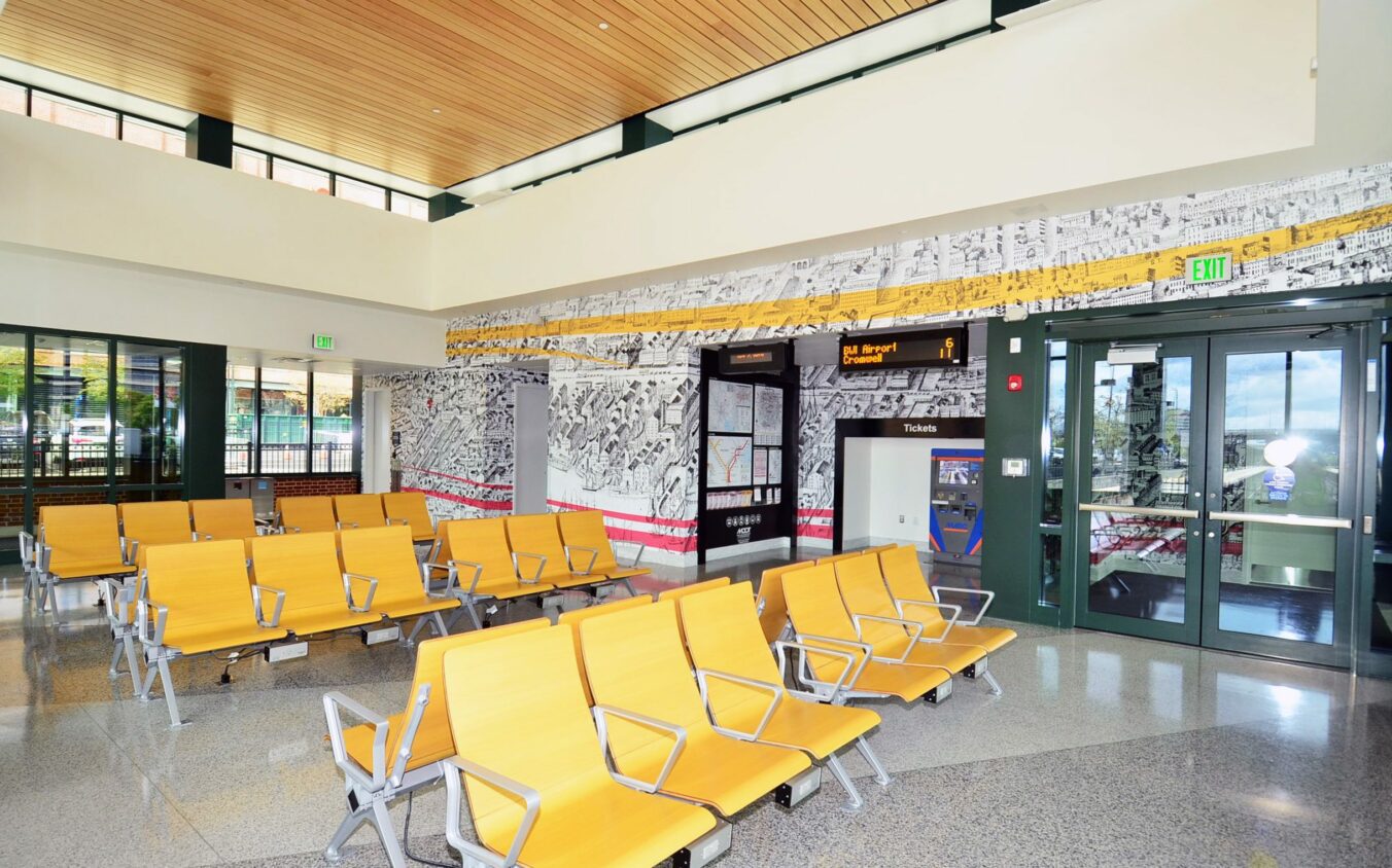 Indoor waiting area with yellow chairs