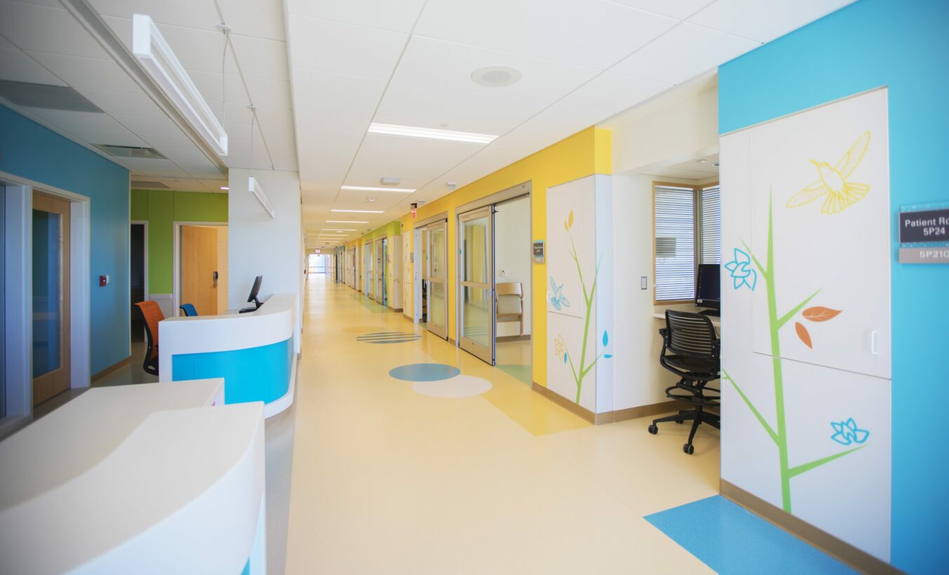 Interior Corridor of Children's Hospital unit. Flowers and bright colors adorn the walls.