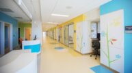 Interior Corridor of Children's Hospital unit. Flowers and bright colors adorn the walls.