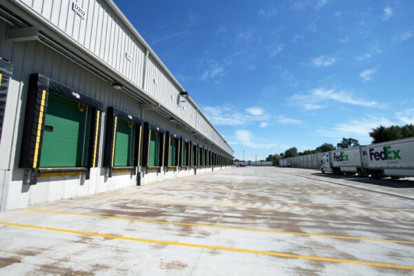 Occupied Distribution Center Expansion - FedEx Chicago Exterior northeast view with truck