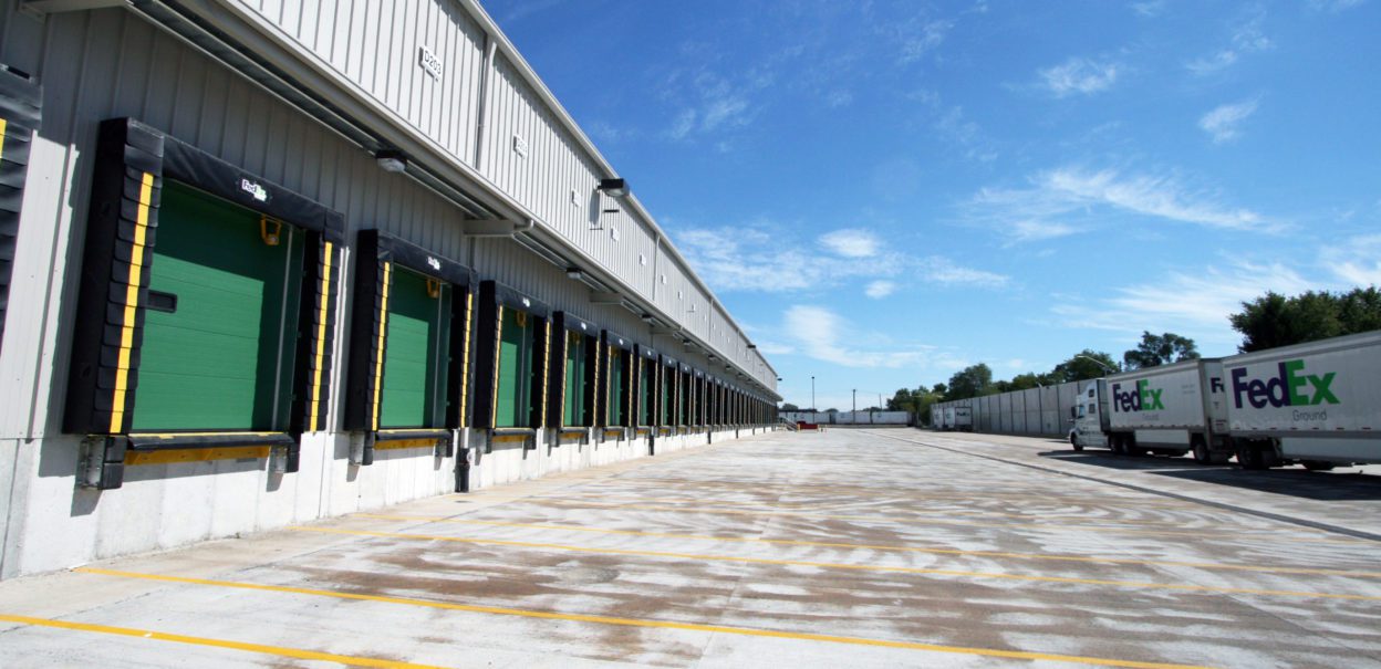 Occupied Distribution Center Expansion - FedEx Chicago Exterior northeast view with truck