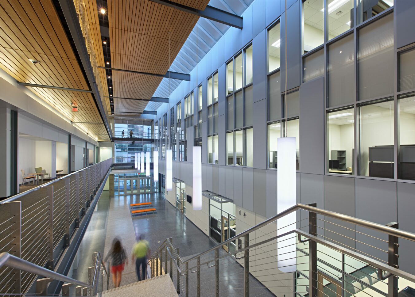 People walking through the lobby of the CBEIS building