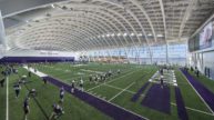 Northwestern University football players practicing on field