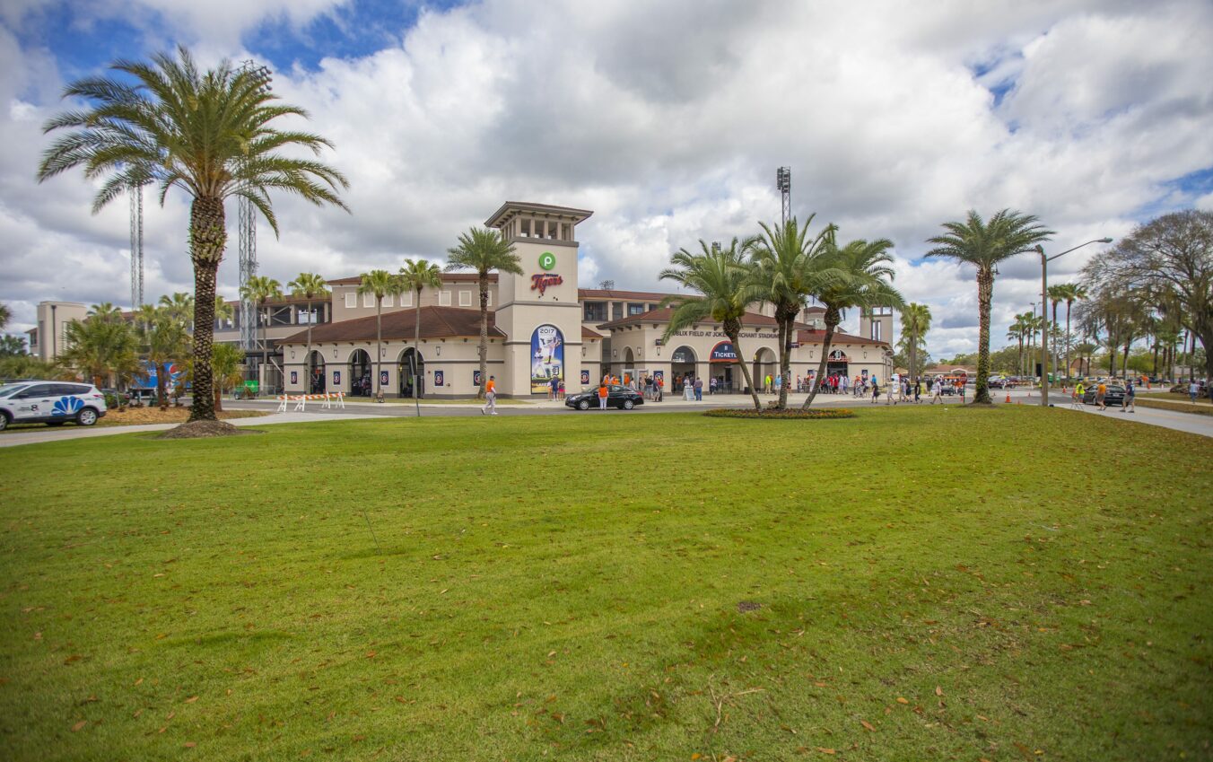 Minor League Baseball Publix Field at Joker Marchant stadium main entrance with palm trees and lush lawn