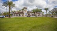 Minor League Baseball Publix Field at Joker Marchant stadium main entrance with palm trees and lush lawn