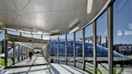 University of Chicago Mansueto Library construction project - hallway with glass panel walls