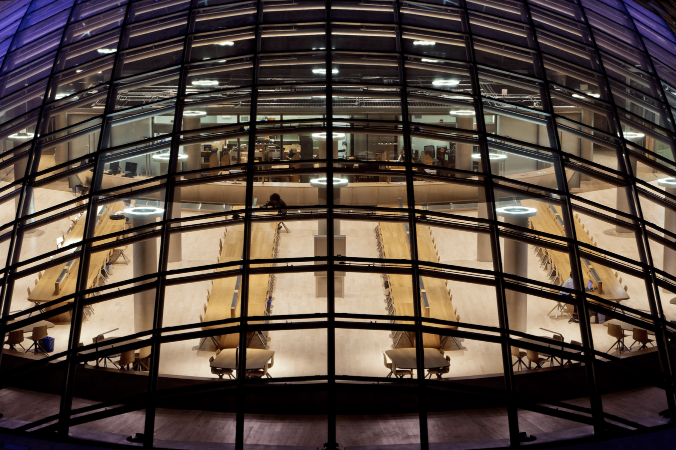 Aerial view of UC Mansueto library glass dome at night - University of Chicago Mansueto Library construction project