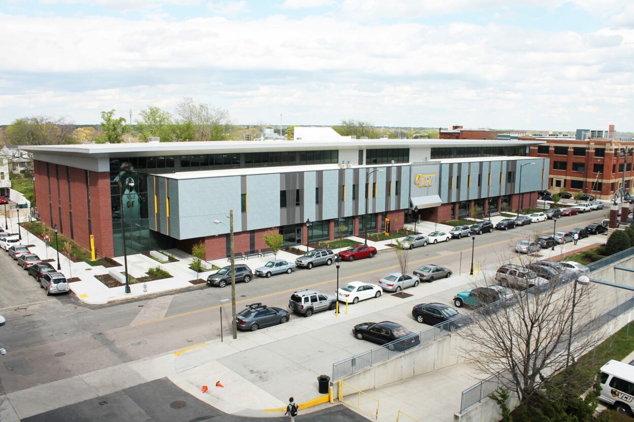 Aerial view of exterior of VCU athletics basketball development center and parking lot