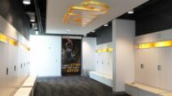 VCU Athletics Basketball Locker room with player's names above white lockers