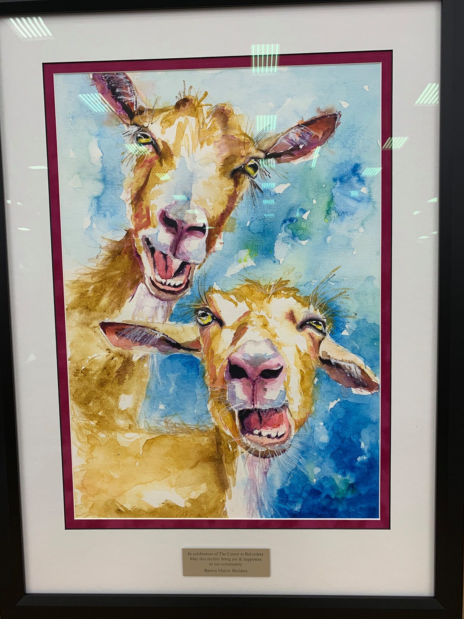 Barton Malow gifted a goat painting to memorialize the sustainable land clearing accomplished by the goats.