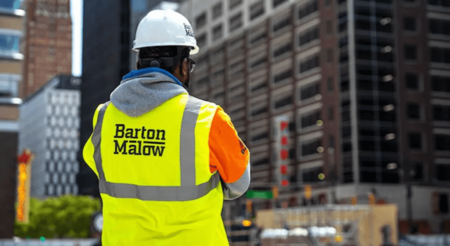 Construction Work with Barton Malow safety vest and hardhat
