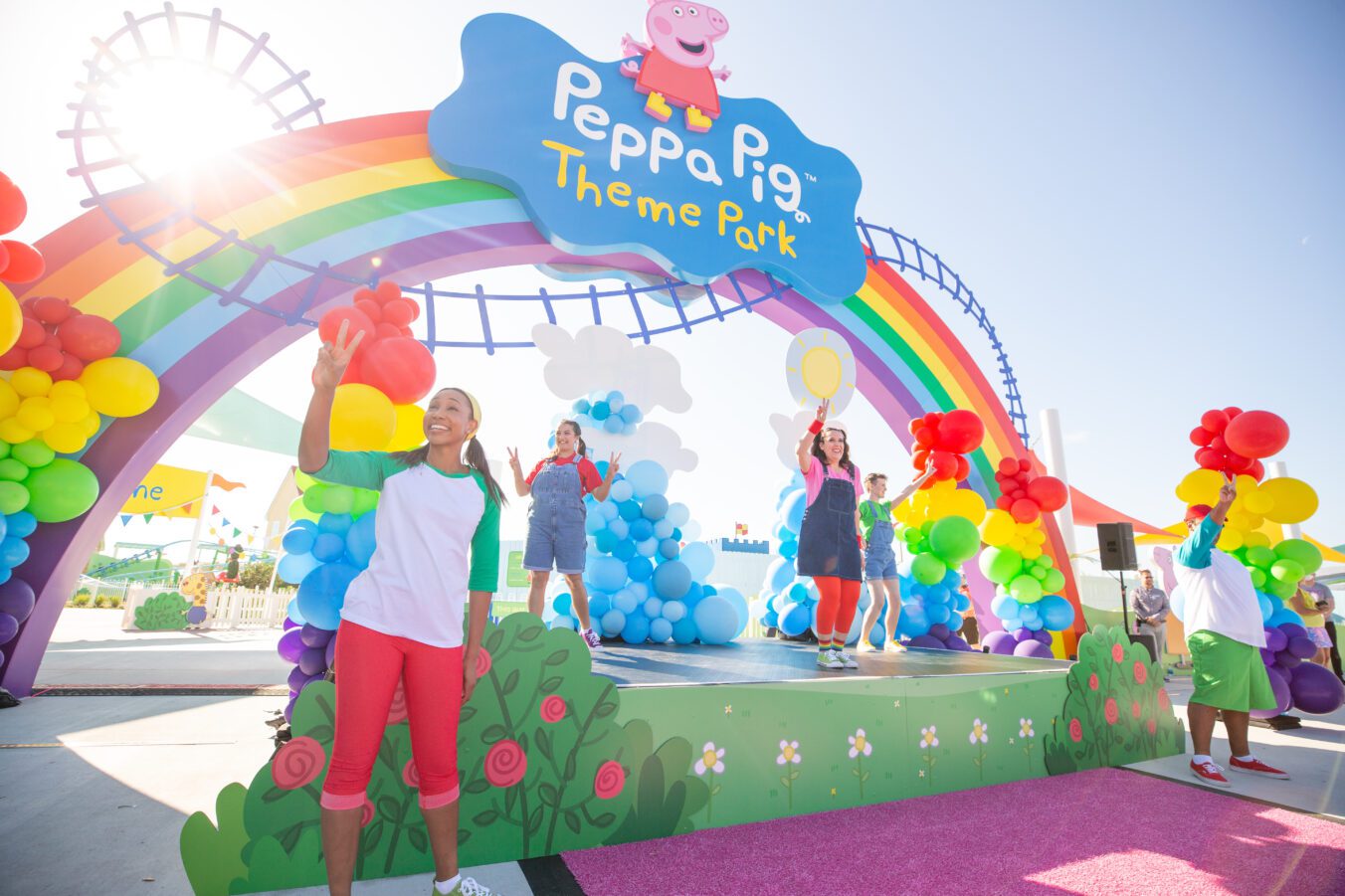 Cast and Characters dance, sing, and entertain guests on the colorful stage