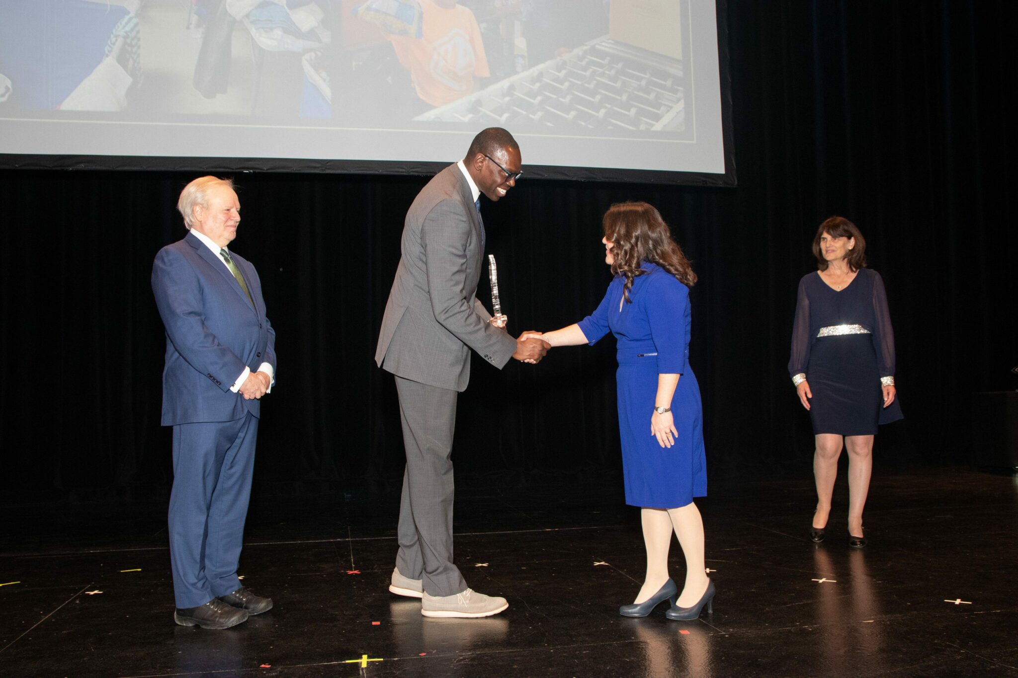 Governor's Service Award given to Barton Malow Executive Vice President MaryAnn Kanary by Lieutenant Governor Garlin Gilchrist. Photos copyright © 2022 by Shrewsbury Photography